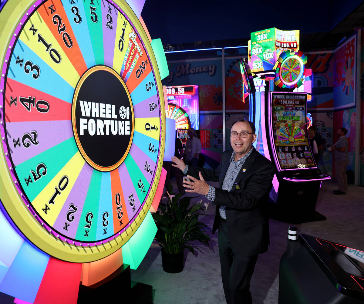 Mr. Khin, IGT President, Global Gaming, shows the Wheel of Fortune on IGT’s GameAce ETG ...