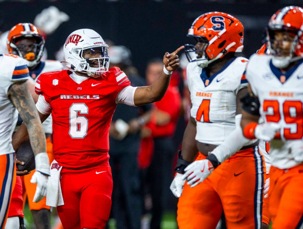 UNLV quarterback Hajj-Malik Williams (6) points to a first down on a run against Syracuse Orang ...