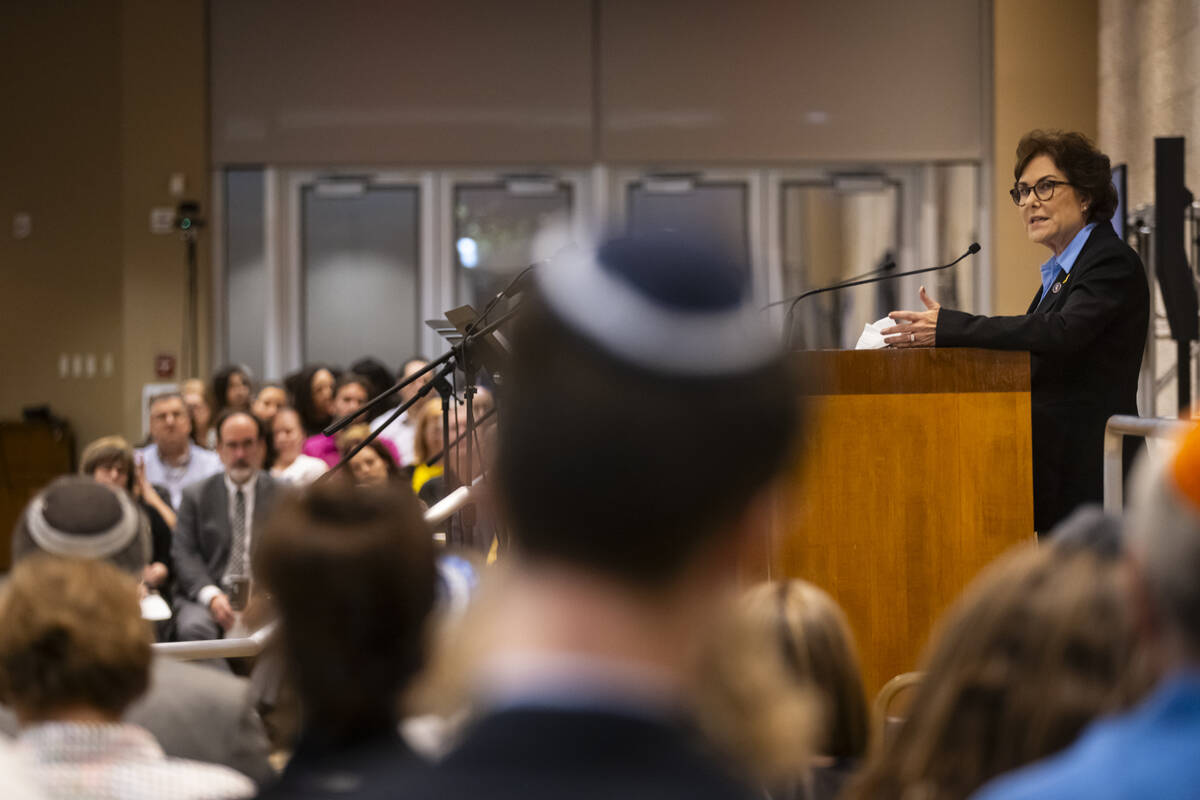 Sen. Jacky Rosen, D-Nev., speaks during a ceremony at Midbar Kodesh Temple marking one year sin ...