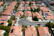 An aerial photo shows homes near Buffalo Drive, on Thursday, June 15, 2023, in Las Vegas. (Bizu ...