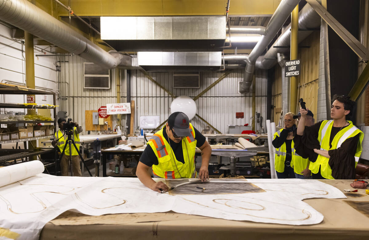 YESCO neon bender Oscar Gonzalez bends a glass tube on Wednesday, Sept. 11, 2024, at YESCO in L ...