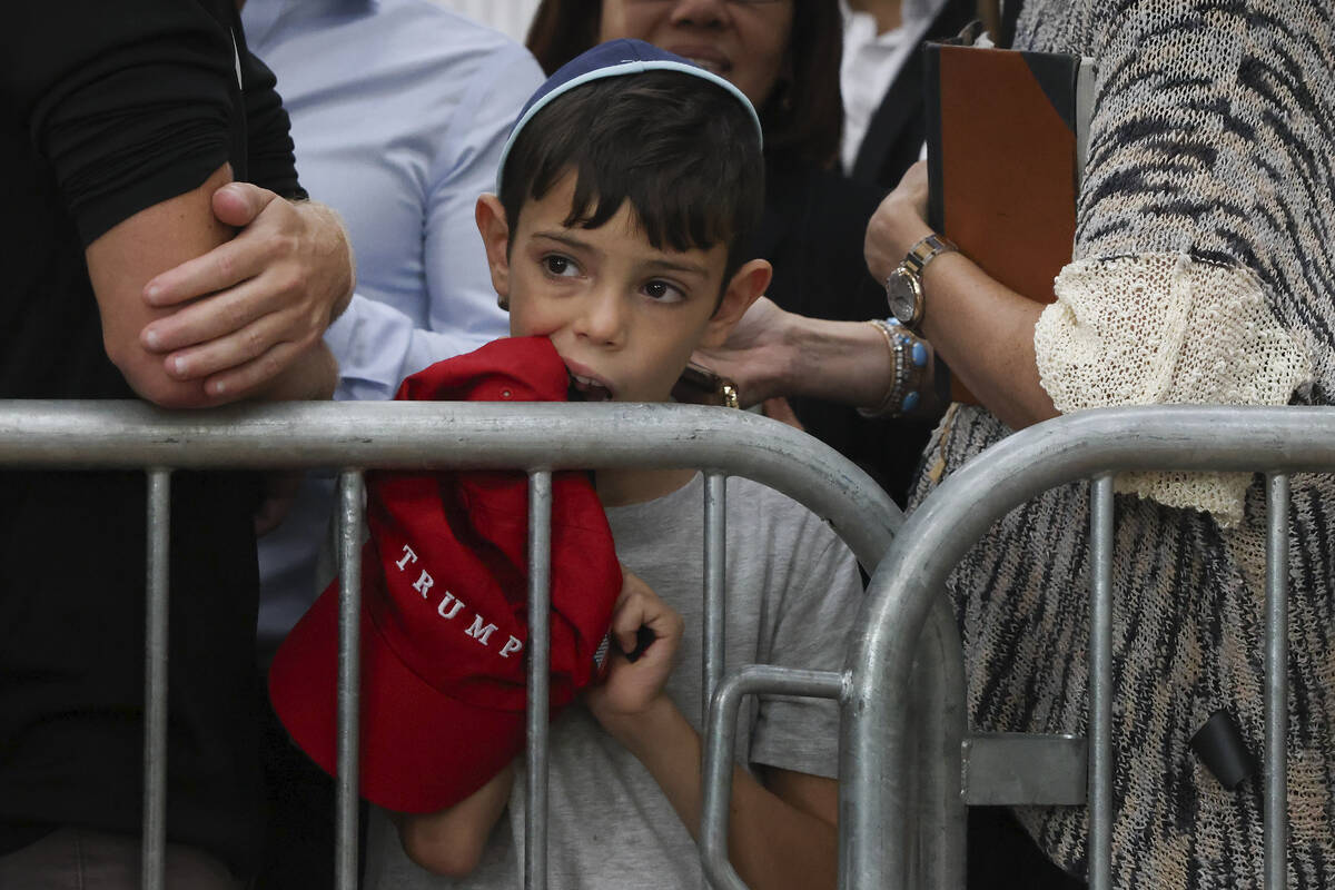 A boy awaits the arrival of Republican presidential nominee former President Donald Trump at Oh ...