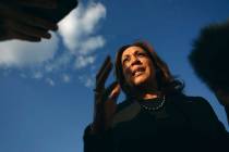 Democratic presidential nominee Vice President Kamala Harris speaks to reporters before boardin ...