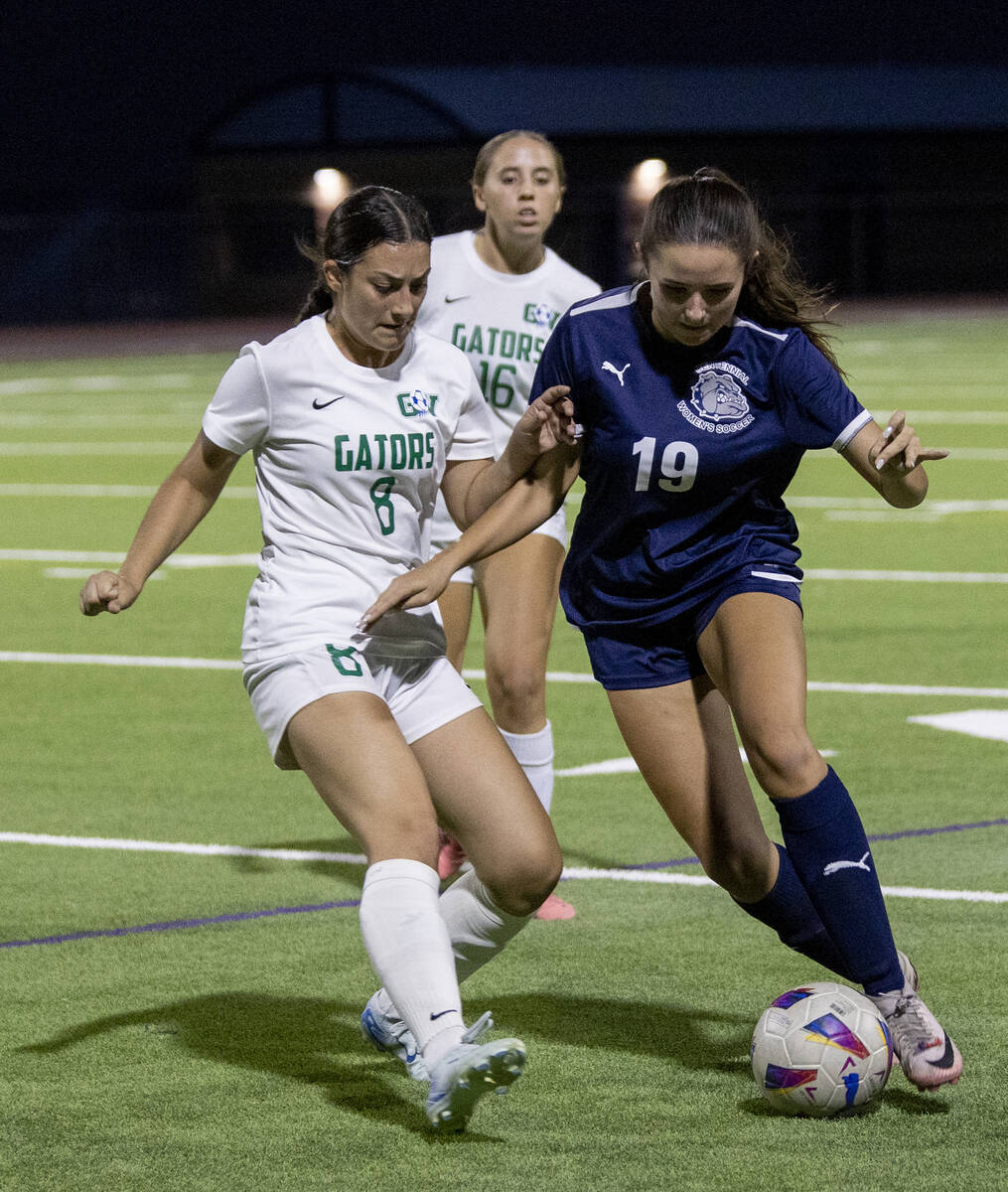 Green Valley midfielder Azlyn Olofson (8) and Centennial midfielder Karly Kramer (19) compete f ...