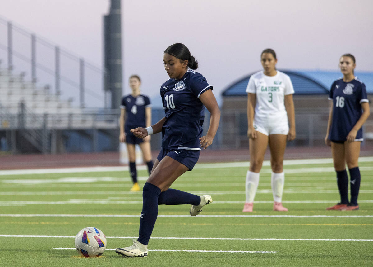 Centennial midfielder Alexandra Miranda (10) attempts a penalty kick, scoring Centennial’s fi ...