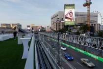 Traffic moves on Las Vegas Boulevard as seen from the grandstands at the Bellagio Fountain Club ...