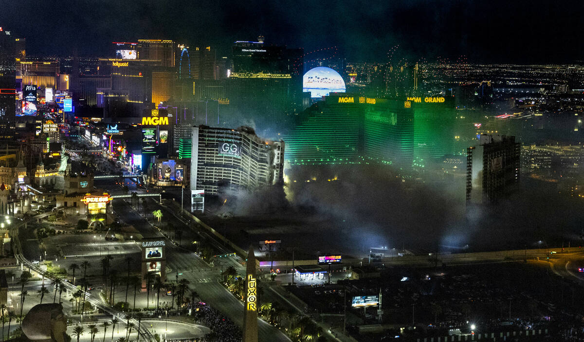 The Tropicana is imploded early in the morning while viewed from the Foundation Room at the Man ...