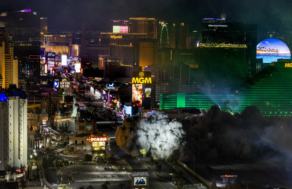 The Tropicana is imploded early in the morning while viewed from the Foundation Room at the Man ...