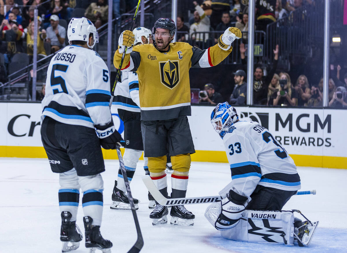 Golden Knights right wing Mark Stone (61) celebrates a score against Utah Hockey Club goaltende ...