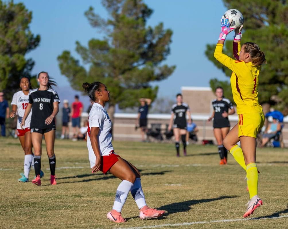 Palo Verde goalkeeper Taylor Bringhurst (1) elevates to secure a ball as Liberty forward Lily R ...