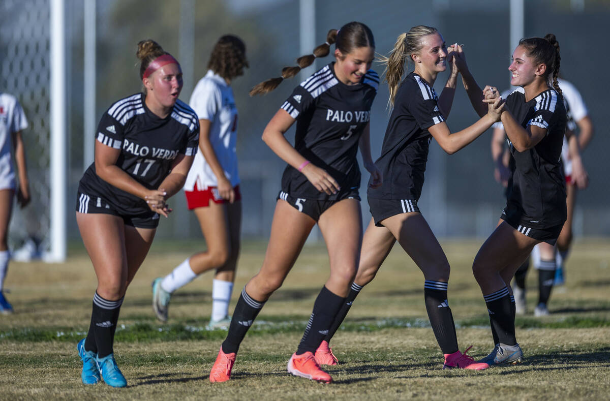 Palo Verde players celebrate a goal against Liberty during the first half of their NIAA soccer ...