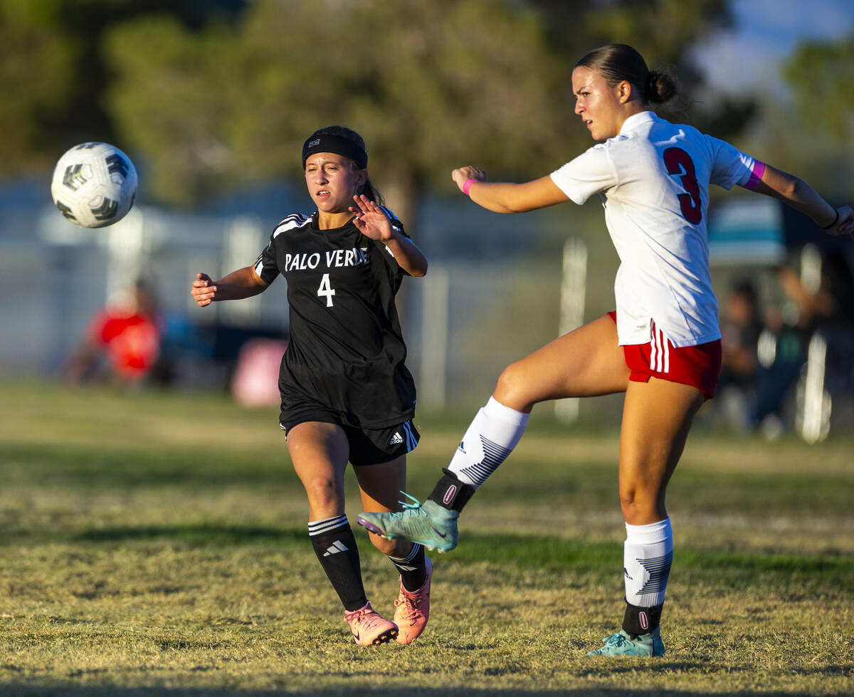 Palo Verde forward Olivia Gastwirth (4) is unable stop stop a kick by Liberty defender Rayen Ga ...