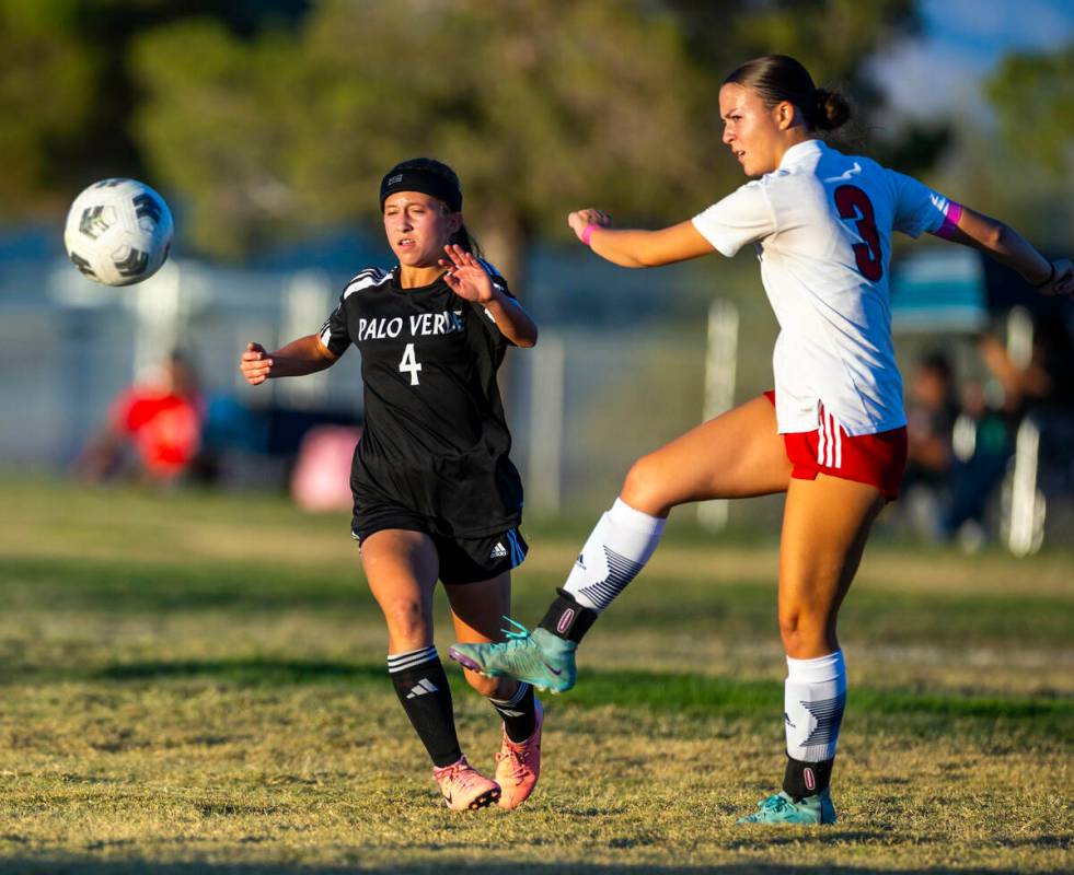 Palo Verde forward Olivia Gastwirth (4) is unable stop stop a kick by Liberty defender Rayen Ga ...