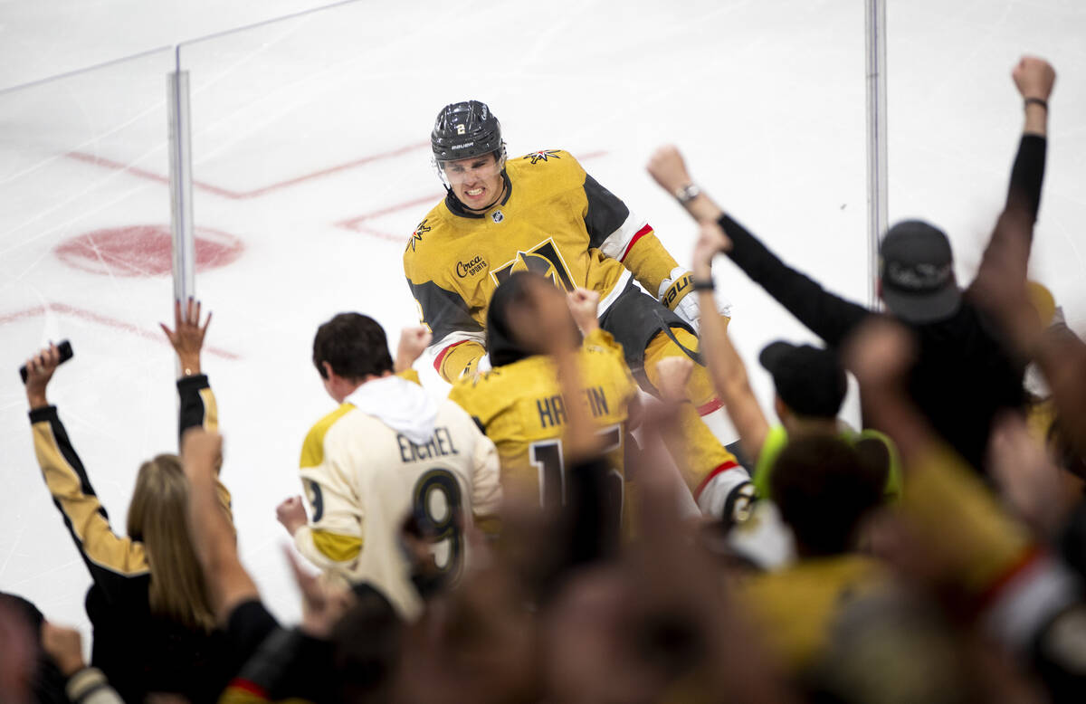 Vegas Golden Knights defenseman Zach Whitecloud (2) celebrates after scoring a goal during the ...