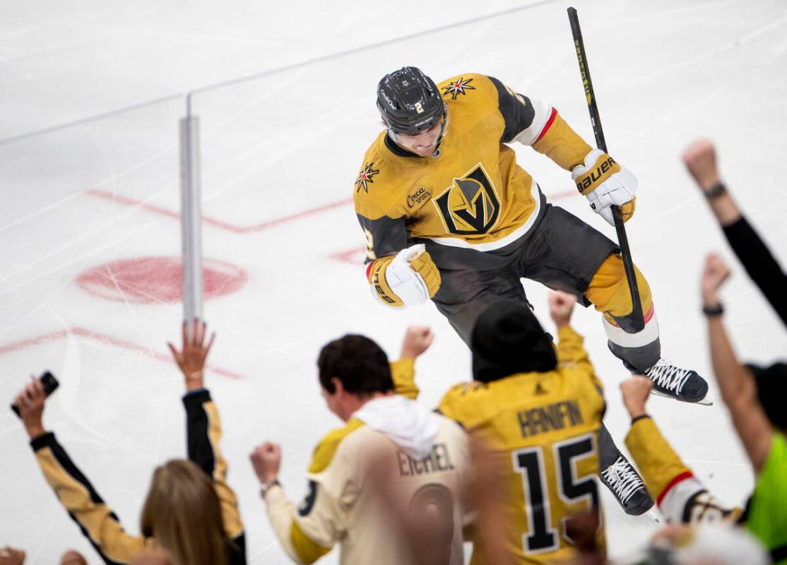 Vegas Golden Knights defenseman Zach Whitecloud (2) celebrates after scoring a goal during the ...