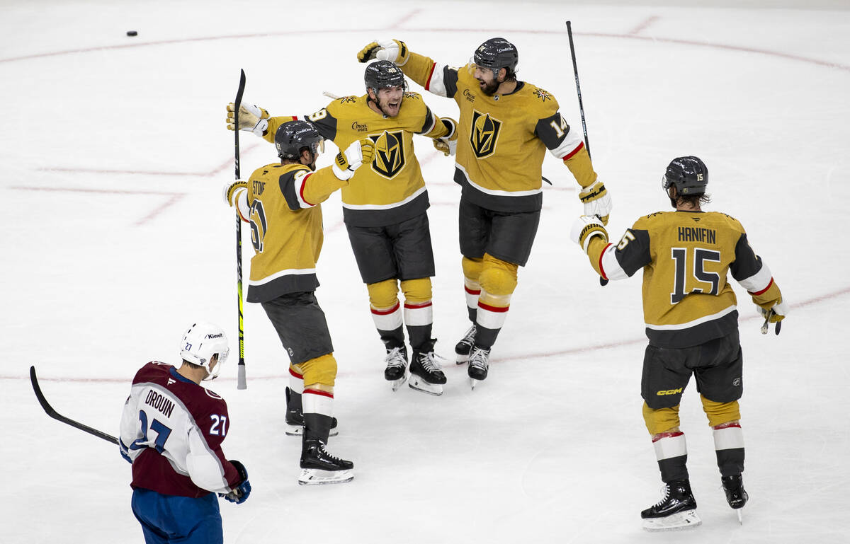 Vegas Golden Knights center Ivan Barbashev (49) celebrates scoring a goal with his teammates du ...