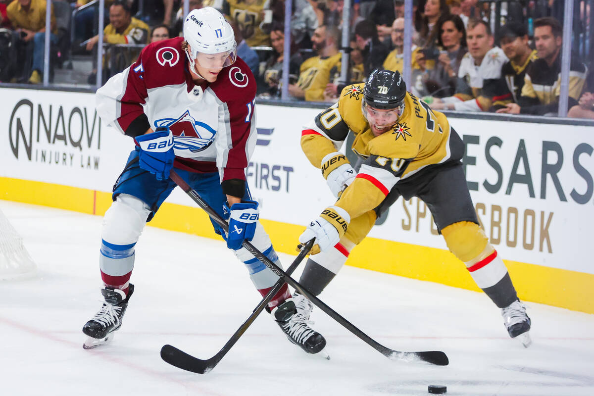 Golden Knights left wing Tanner Pearson (70) forces his way to the puck while Colorado Avalanch ...