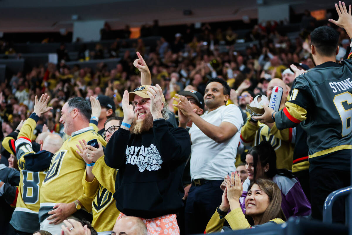 Golden Knights fans celebrate a goal during the Golden Knights’ NHL hockey season home o ...