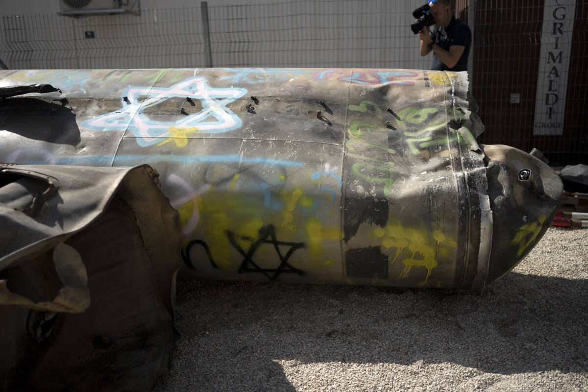 Iranian ballistic missile components that were fired at Israel are displayed during a governmen ...