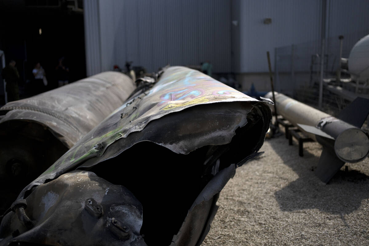 Iranian ballistic missile components that were fired at Israel are displayed during a governmen ...