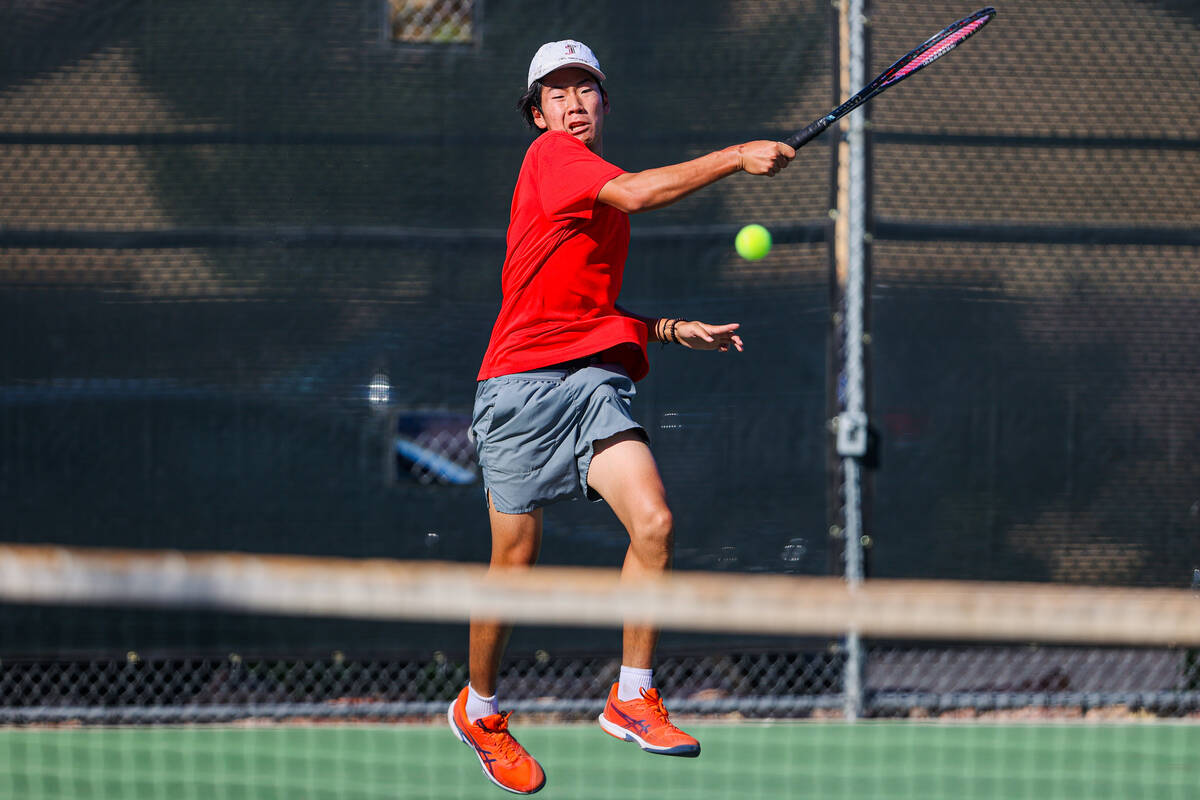 Coronado’s Grant Lee laughs during a 5A high school boys tennis state championships matc ...