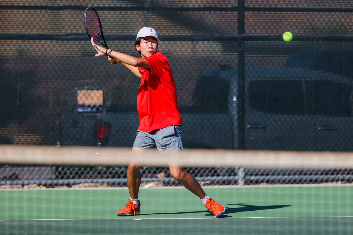 Coronado’s Grant Lee laughs during a 5A high school boys tennis state championships matc ...