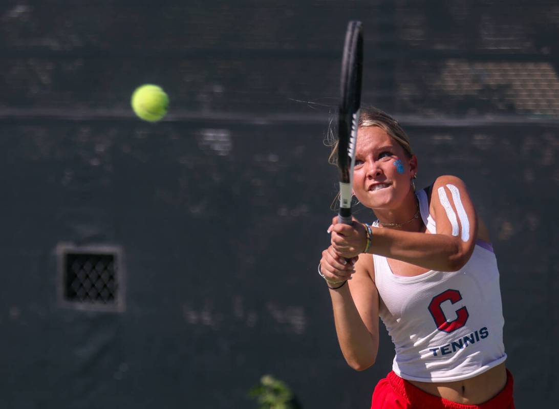 Coronado High School’s Gigi Smart swings to return the ball during a match against Palo ...