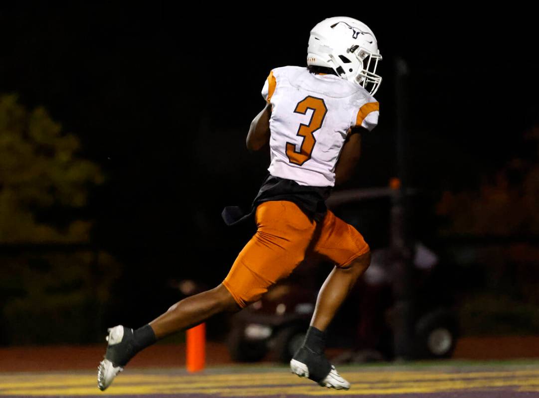 Legacy High's Caden Bridgewater(3 runs for a touchdown against Faith Lutheran during the first ...