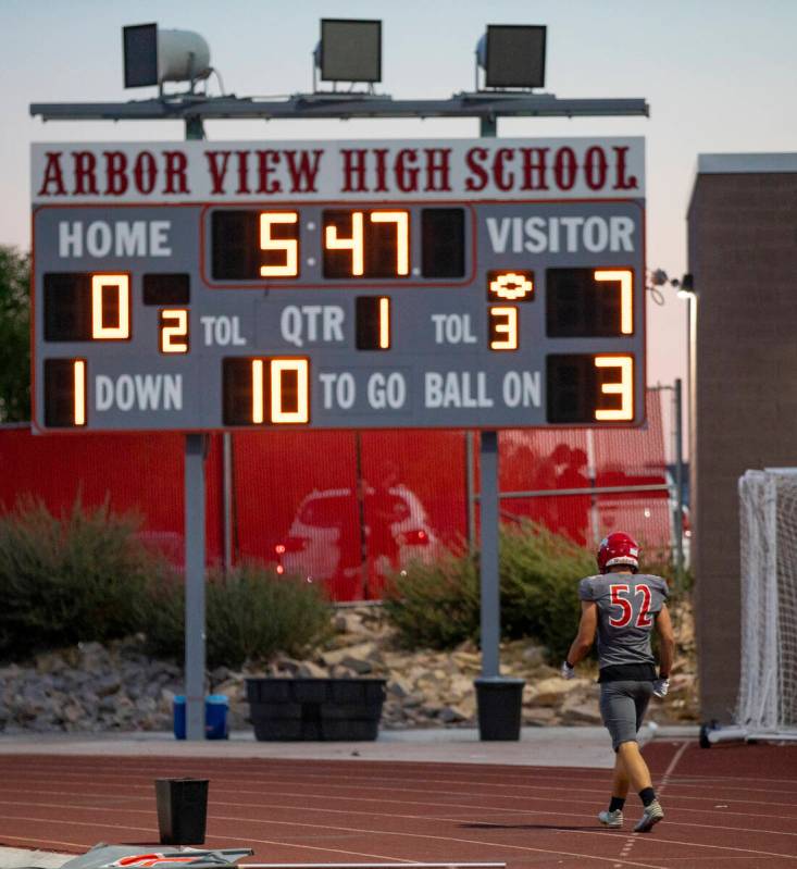 Arbor View linebacker Rocky Campbell (52) leaves the game after being ejected for unsportsmanli ...