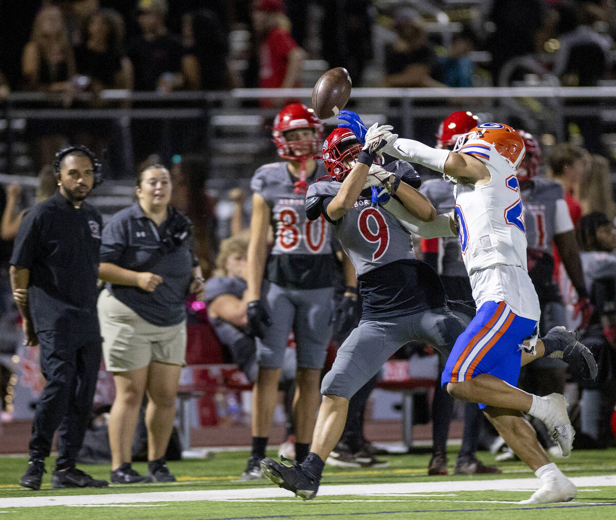 Bishop Gorman defensive back Alexander Perez (20) interrupts a pass to Arbor View wide receiver ...