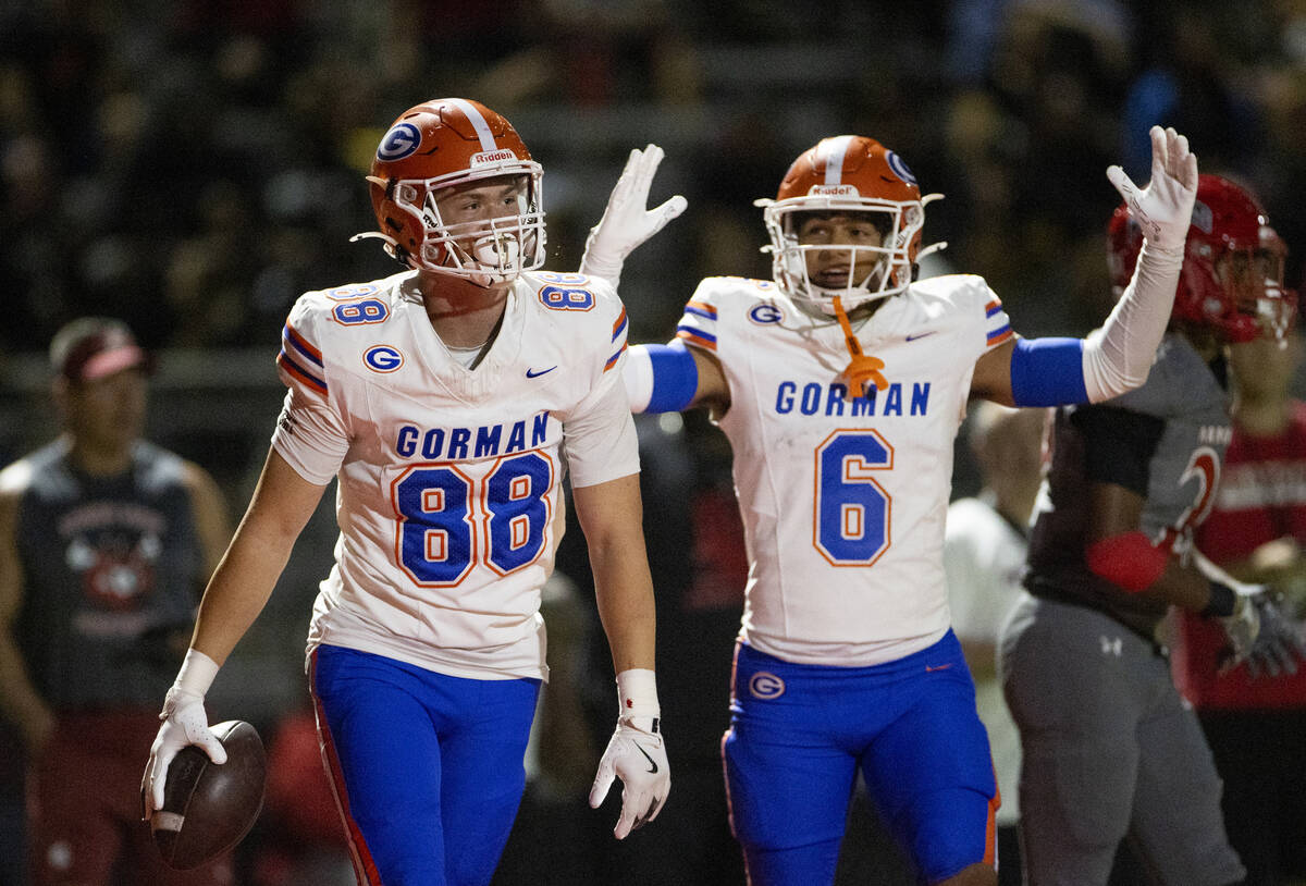 Bishop Gorman wide receiver Brandon Gaea (6) celebrates a touchdown scored by tight end Anthony ...