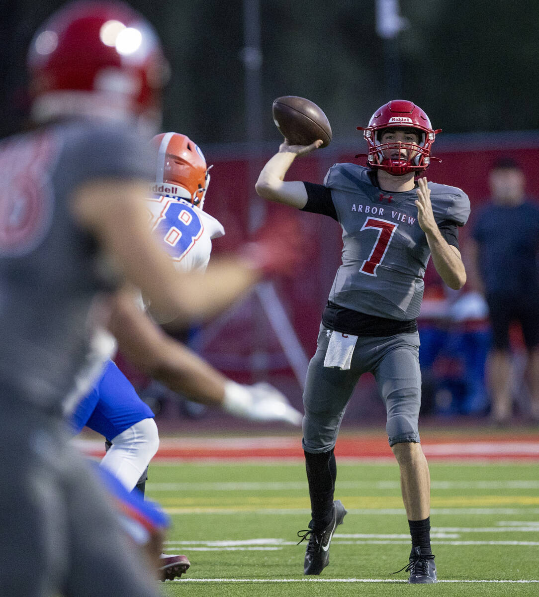 Arbor View quarterback Thaddeus Thatcher (7) throws the ball during the high school football ga ...