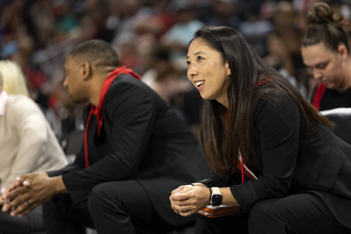 Las Vegas Aces assistant head coach Natalie Nakase reacts to a referee’s call from the sideli ...