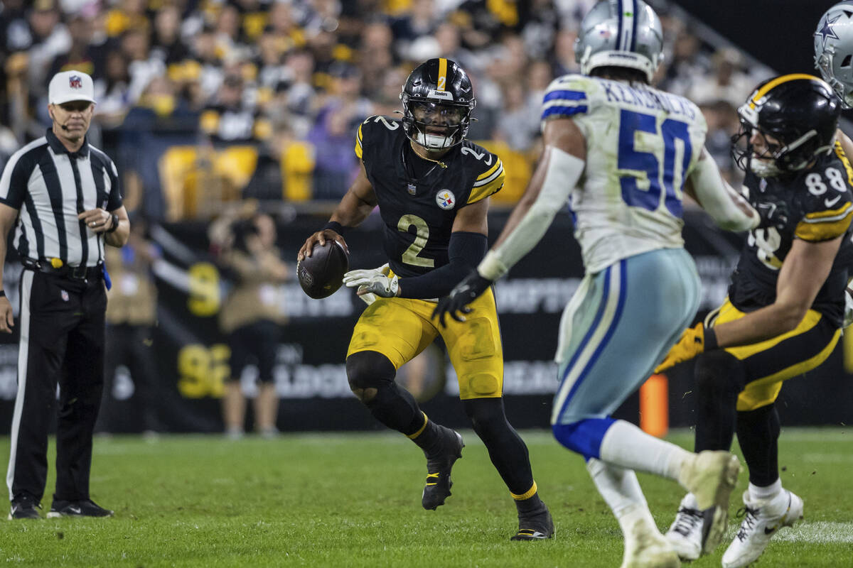 Pittsburgh Steelers quarterback Justin Fields (2) scrambles during an NFL football game, Sunday ...