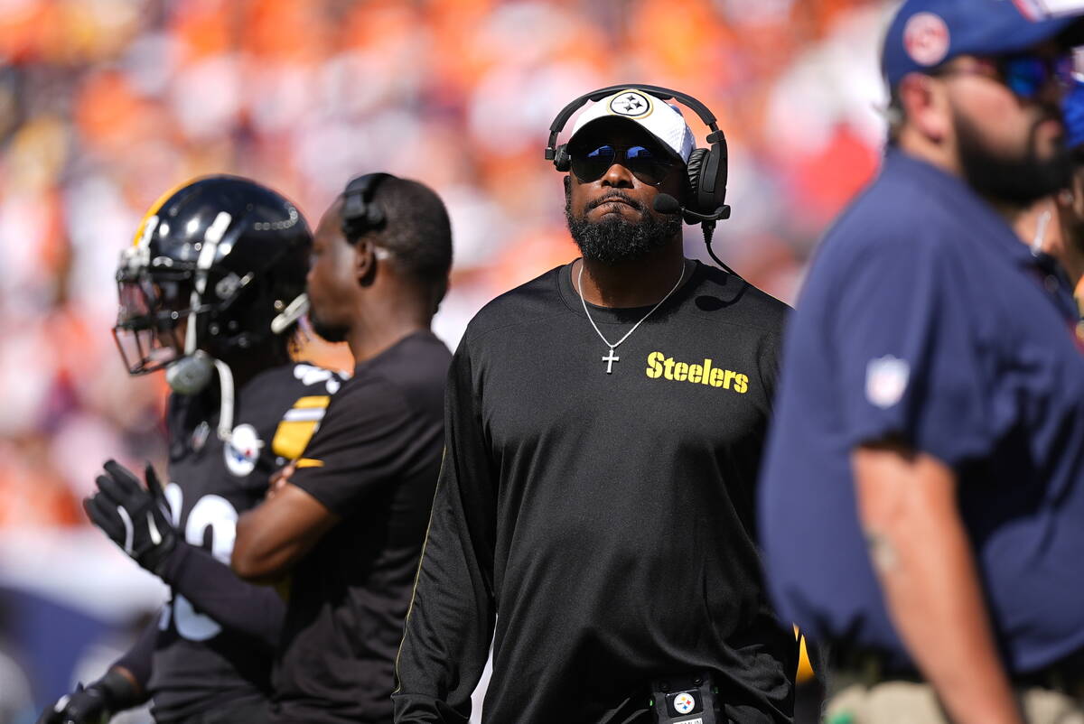 Pittsburgh Steelers head coach Mike Tomlin watches during the first half of an NFL football gam ...