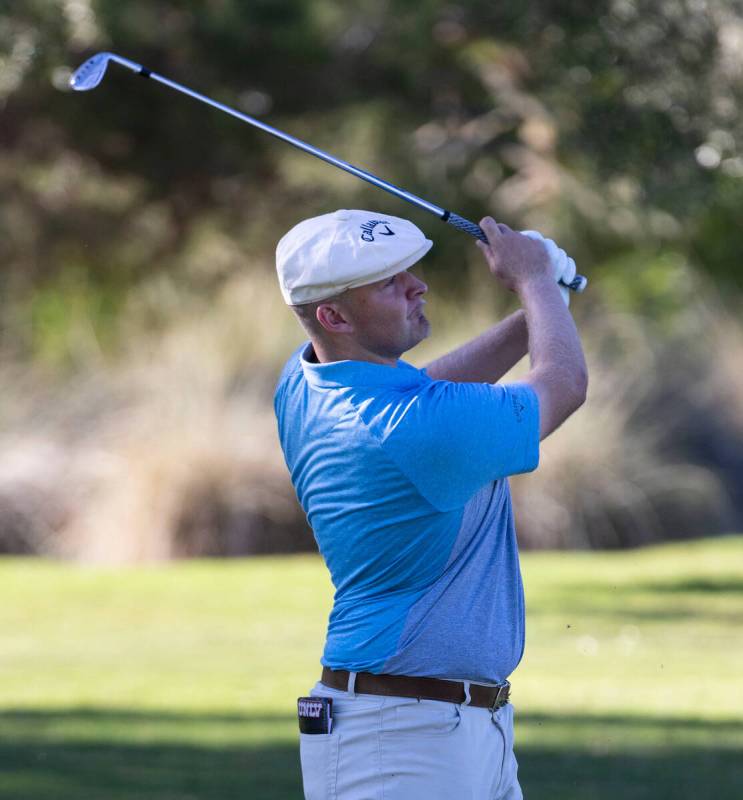 Harry Hall watches his drive to the tenth green during the first round of the Shriners Children ...