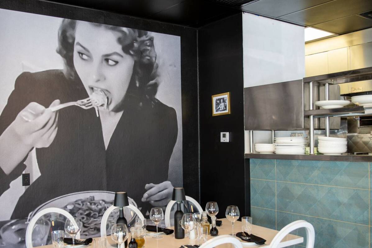 An image of screen legend Sophia Loren tucking into spaghetti in the dining room of Brunello LV ...