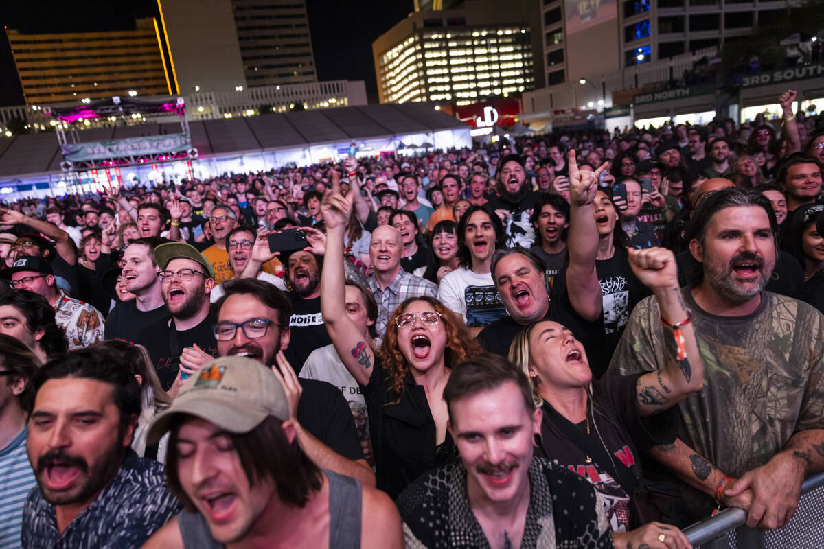 Fans cheer for The Jesus Lizard during the final night of Best Friends Forever Festival at the ...