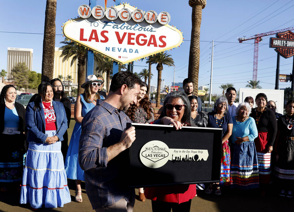 Commissioner Michael Naft presents Key to the Las Vegas Strip to SMGHA Secretary Carla Rodrigue ...