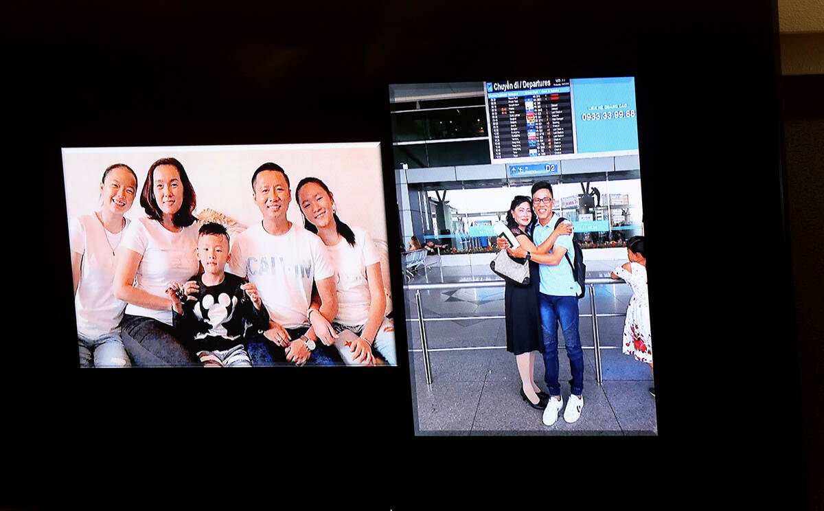 Photos of the families of Sang Boi Nghia, left, and Khoung Ba Le Nguyen are shown during Chief ...