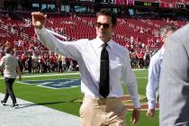 Former quarterback Tom Brady waves to fans before an NFL football game between the San Francisc ...