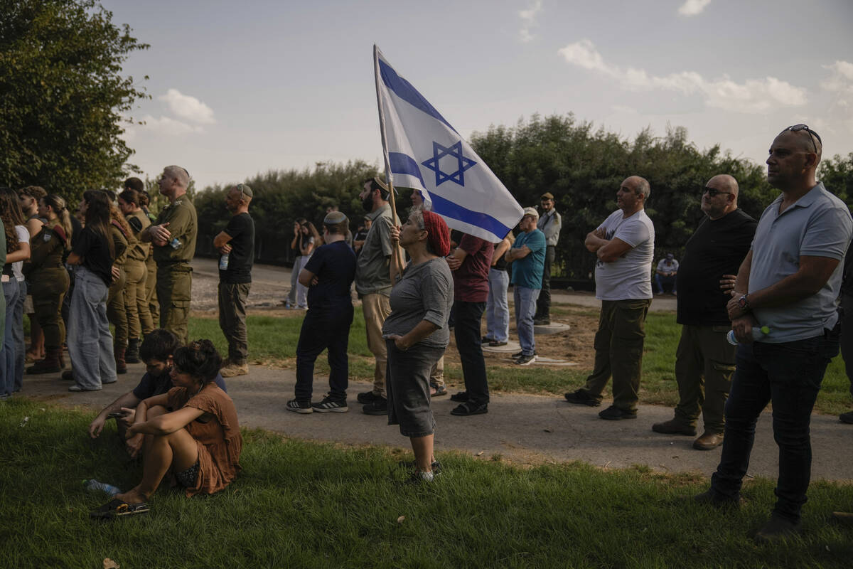 People mourn Israeli soldier Sgt. Amitai Alon, killed by a Hezbollah drone attack, during his f ...