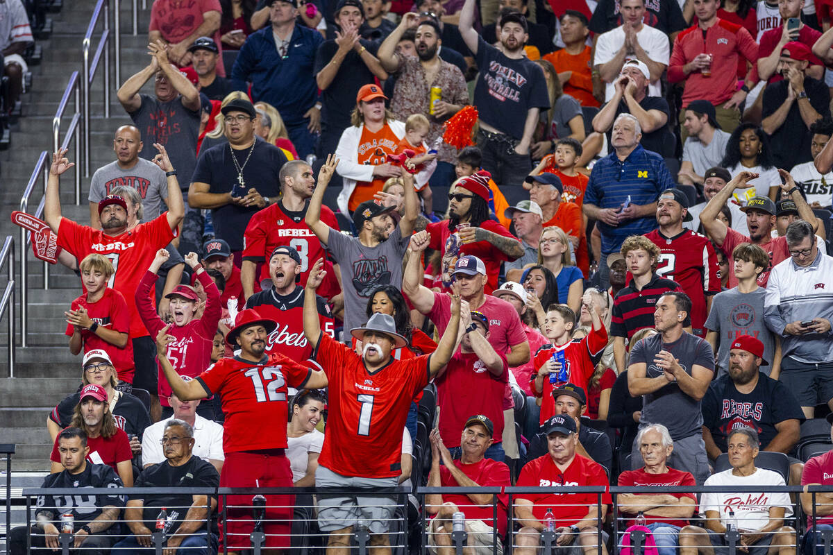 UNLV fans react to another score while battling the Syracuse Orange during the first half of th ...