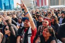 Festival attendees take in a set by A Perfect Circle during the Sick New World music festival a ...