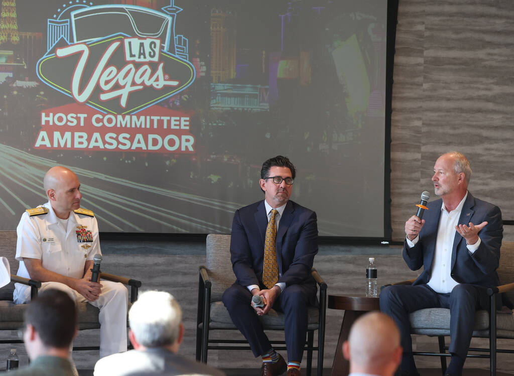 Las Vegas Convention and Visitors Authority President and CEO Steve Hill, right, speaks about h ...