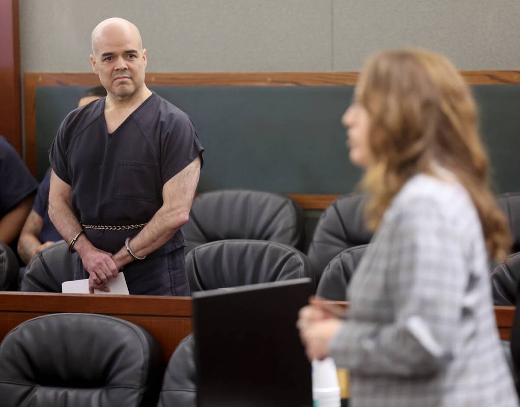 Robert Telles, left, listens as Chief Deputy District Attorney Pamela Weckerly talks in court b ...