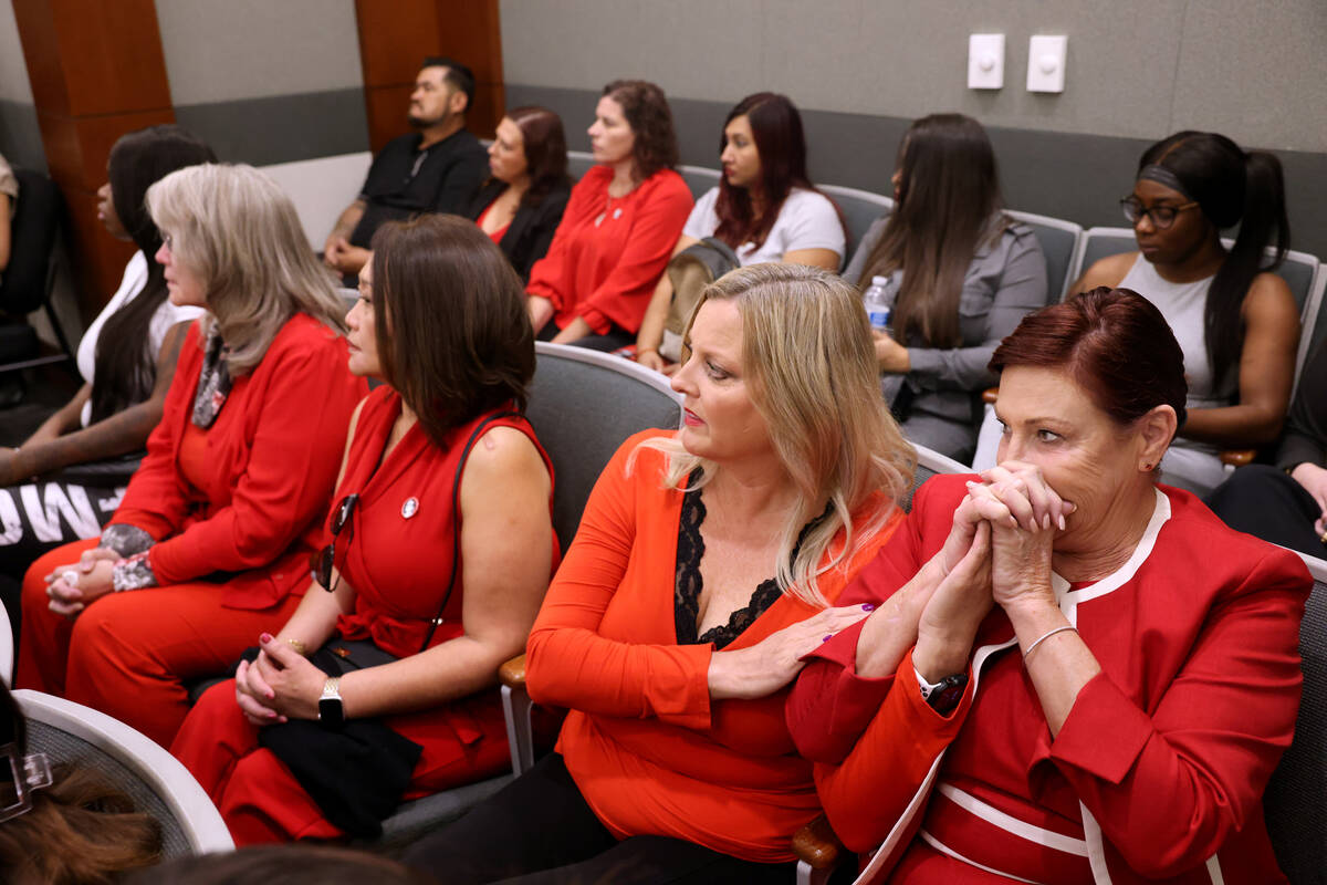 Former coworkers of Robert Telles, from right, Benet Murphy, Aleisha Goodwin, Noraine Pagdangan ...