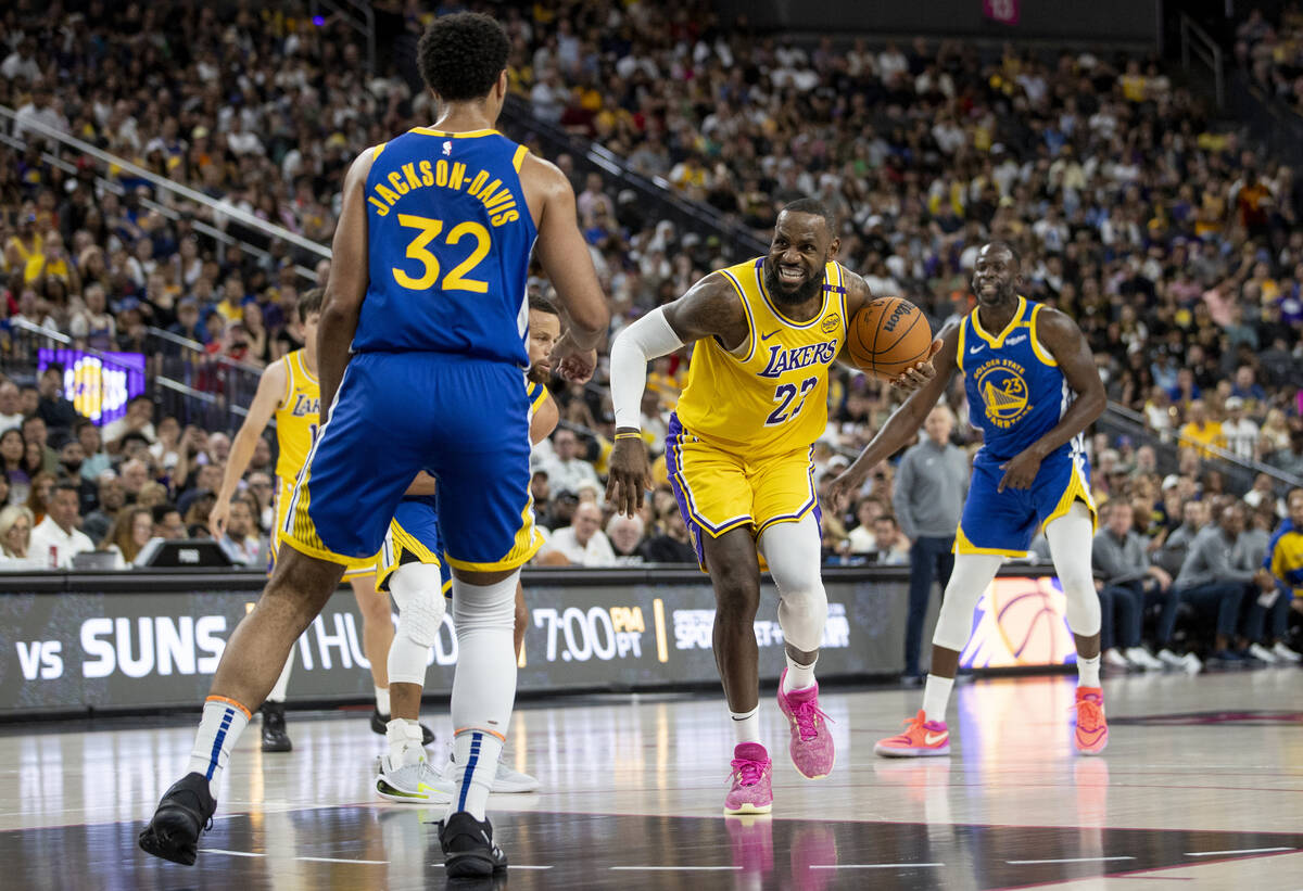 Los Angeles Lakers forward LeBron James (23) rushes toward the paint during the NBA preseason b ...