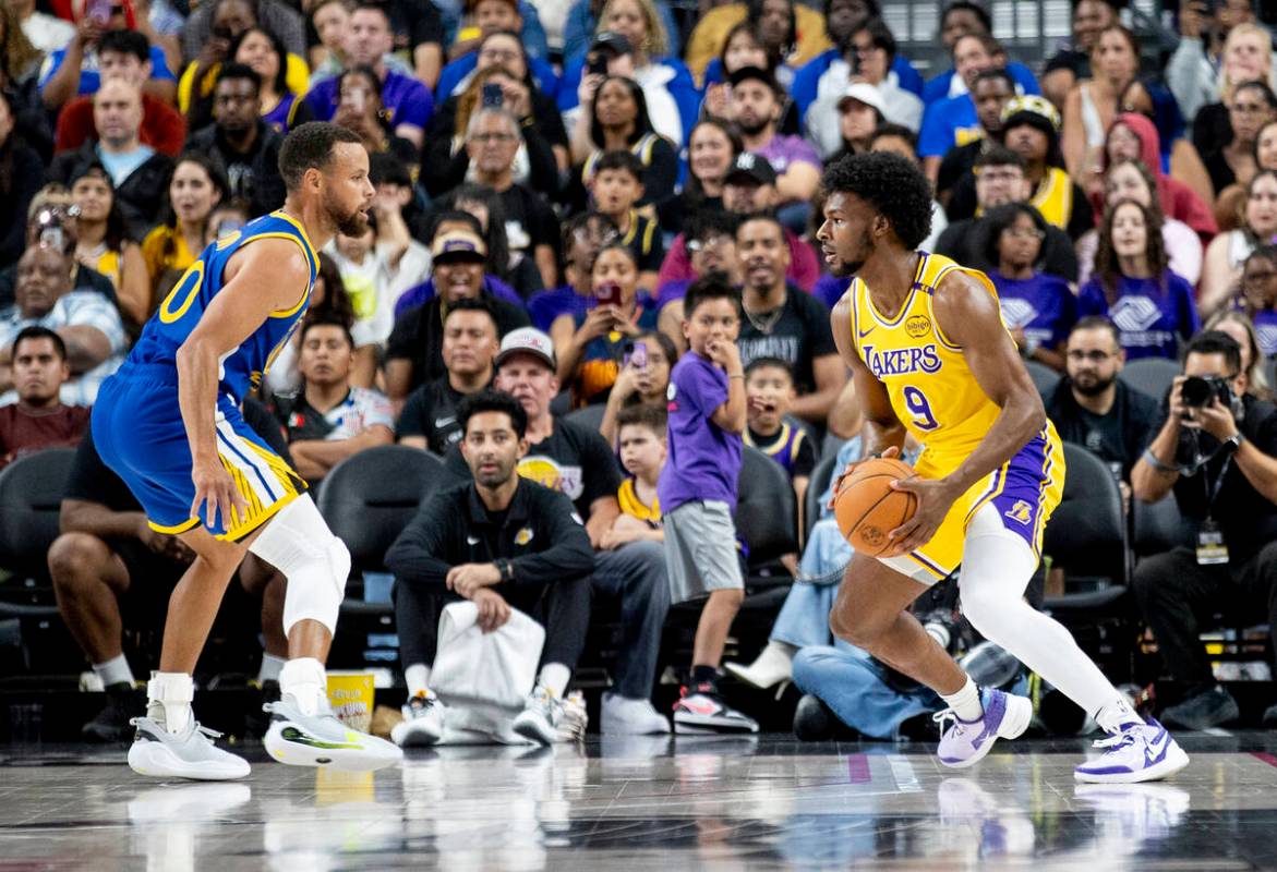 Los Angeles Lakers guard Bronny James Jr. (9) competes against Golden State Warriors guard Step ...