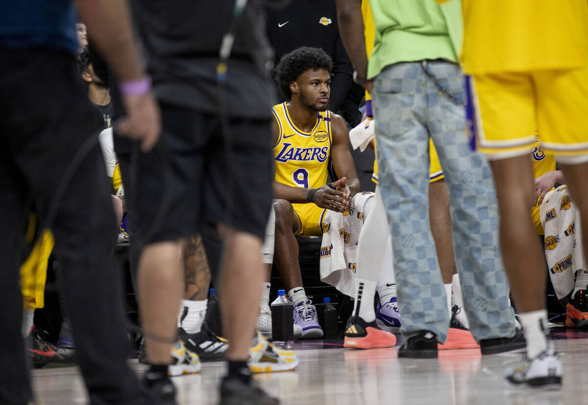 Los Angeles Lakers guard Bronny James Jr. (9) sits on the bench during the NBA preseason basket ...